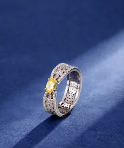 Macro shot of S925 silver ring featuring yellow oval zircon and leaf-shaped diamond accents