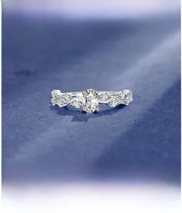 Macro view of vintage vine band with micro-paved oval cut sparkling high carbon diamond