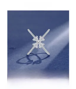 Macro shot of micro-pave setting process showing snowflake zircon in 925 sterling silver