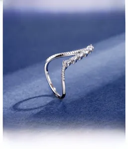 Macro view of S925 sterling silver V-shape ring with micro-pave pear-cut crystals