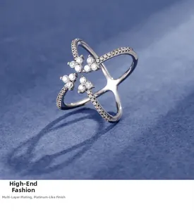Close-up of four-claw silver ring with multi-layer plating and platinum texture