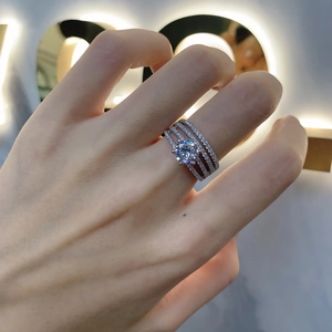 Luxurious S925 sterling silver multi-layer sparkling diamond ring on a hand model