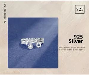 Close-up of S925 sterling silver triple-layer chain ring with heart and diamond charms