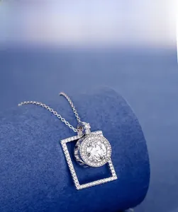 Macro shot of S925 sterling silver spinning pendant with square frame and 5A zircon