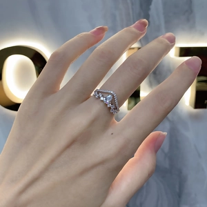 Elegant S925 sterling silver crown ring featuring a sparkling teardrop shaped gemstone
