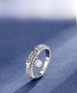 Detail of s925 silver triple-layer chain ring with heart charm and 5A cubic zirconia