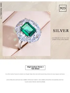 Macro shot of 925 sterling silver ring with emerald cut green carbon stone and marquise cubic zirconia