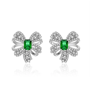 Elegant silver bow stud earrings with emerald-cut green stone and white zircon accents