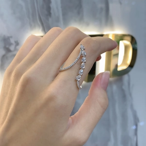 Minimalist 925 sterling silver open ring with teardrop zirconia in an asymmetric design