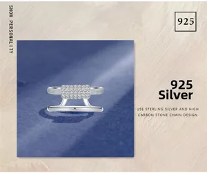 Detailed close-up of double-layer 925 sterling silver ring with micro-pave cubic zirconia