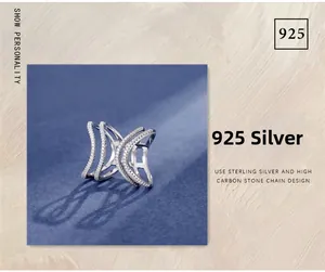 Detailed view of 925 sterling silver multilayer curved ring set with shimmering stones