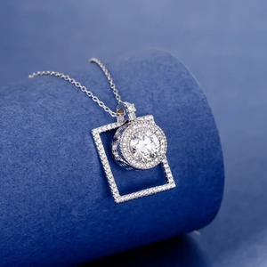 Rotating geometric S925 sterling silver necklace with cubic zirconia for modern women