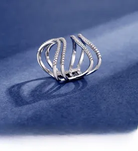Macro view of multi-layered S925 sterling silver ring with sparkling pavé cubic zirconia