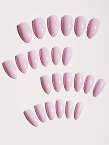 Close-up of glossy light pink almond-shaped press-on nails set on white background