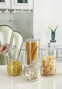 Detail showing airtight storage jars with silver bear handles and clear plastic body