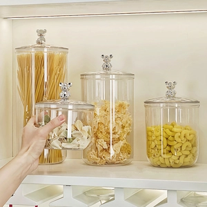 Transparent food storage jars with silver bear lid for kitchen organization