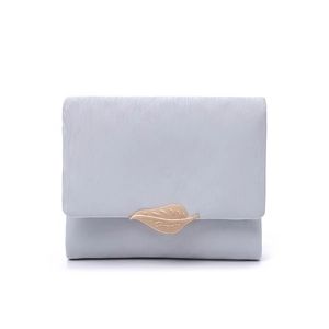 Close-up of light grey leaf buckle wallet with textured satin finish and golden clasp