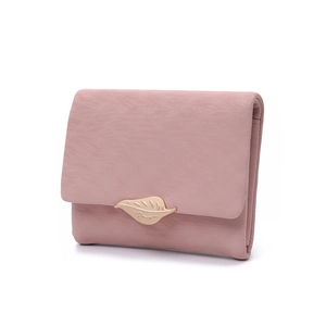 Detail view of pink short wallet featuring gold leaf clasp with texture finish