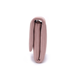 Detailed side view of pink faux leather wallet showing multi-layered compartments