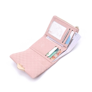 Internal detail of pink PU leather wallet showing multi-card slots and leaf buckle