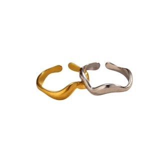Minimalist wave-shaped open stainless steel rings in gold and silver finish