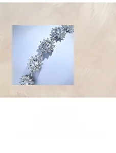 Detailed close-up of S925 sterling silver sunflower bracelet with micro-paved 5A cubic zirconia