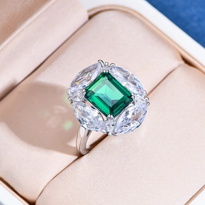 Emerald cut green gemstone ring in 925 sterling silver with marquise side stones