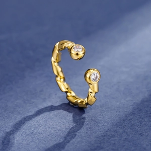 Elegant S925 sterling silver twist ring with gold plating and dual zircon stones