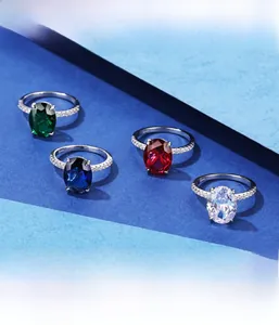 Detail of S925 sterling silver rings with oval cut gemstones and micro-pave setting