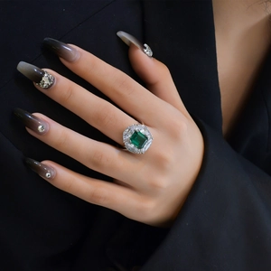 S925 sterling silver ring with emerald cut green gemstone and marquise zircons
