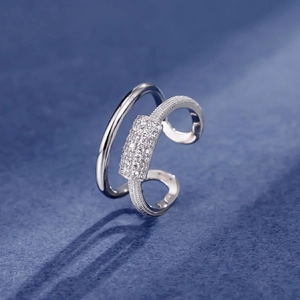 Modern double layered sterling silver ring with micro paved zircon stones in a polished finish