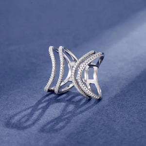 Exaggerated silver wave ring with multiple rows of sparkling white zircon stones