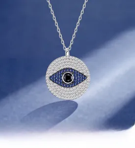 Close-up of S925 sterling silver evil eye necklace with blue zircon and platinum plating