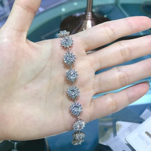 Macro shot of S925 sterling silver sunflower bracelet with sparkling zircon stones