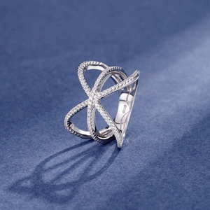 Exaggerated S925 sterling silver criss-cross ring with pavé-set sparkling crystals