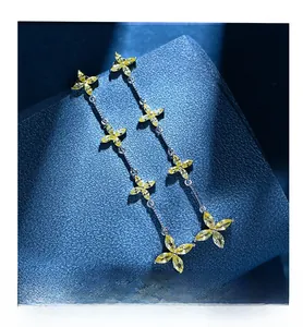 Detail of yellow zircon petal tassel earrings with S925 sterling silver long drop design
