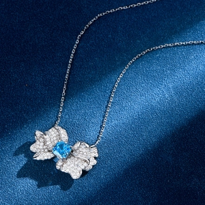 925 silver butterfly wing necklace with sea blue crystal and pavé set zircon stones