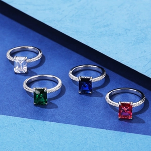 925 silver emerald cut rings with four-claw setting in emerald, blue, and red gems