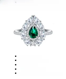 Macro view of S925 silver ring featuring pear-cut green gemstone with product dimensions