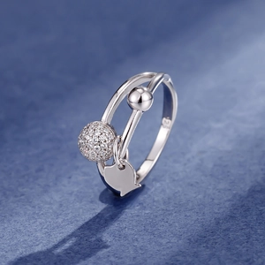 S925 sterling silver double layer ring with zircon bead and cat charm on blue background