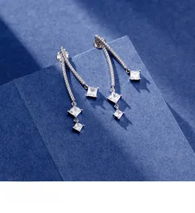 Close-up of S925 sterling silver tassel earrings with multi-layer platinum plating