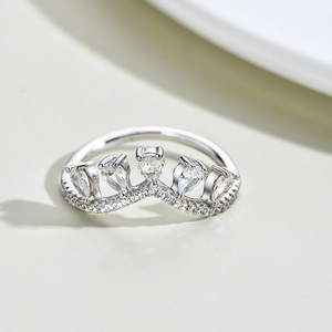 Sparkling S925 sterling silver crown ring with teardrop stones and V-shaped diamond band