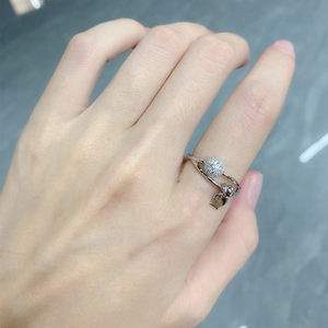 Sterling silver minimalist ring featuring a paved CZ ball and heart pendant for women