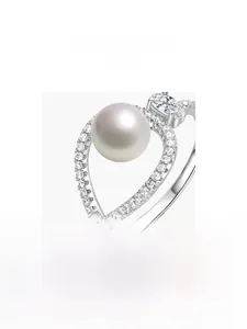 Macro shot of 925 silver ring featuring a lavender pearl and micro-set zirconia stones