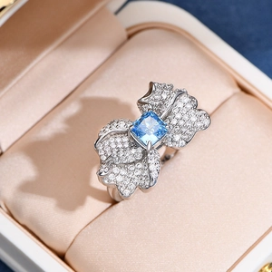 Elegant 925 sterling silver butterfly ring with a square blue gemstone and micro diamonds