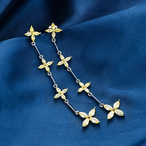 Elegant S925 silver petal tassel earrings with yellow marquise-cut stones on blue silk