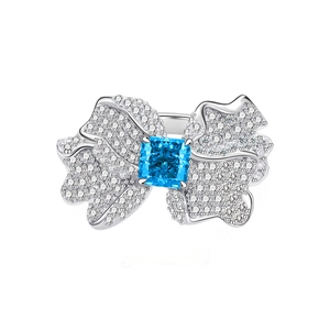 925 silver butterfly ring with square sky blue center stone and sparkling side pavé