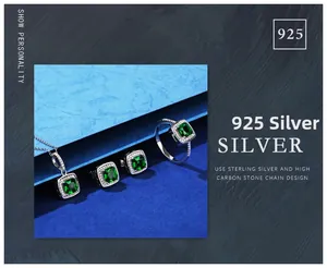 Macro view of 925 sterling silver jewelry set featuring square green gemstones