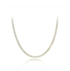 Macro view of a 4mm gold tennis necklace featuring brilliant square-cut diamond accents