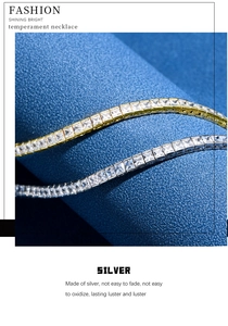 Detailed macro view of 4mm silver and gold tennis necklaces with cubic zirconia on blue silk